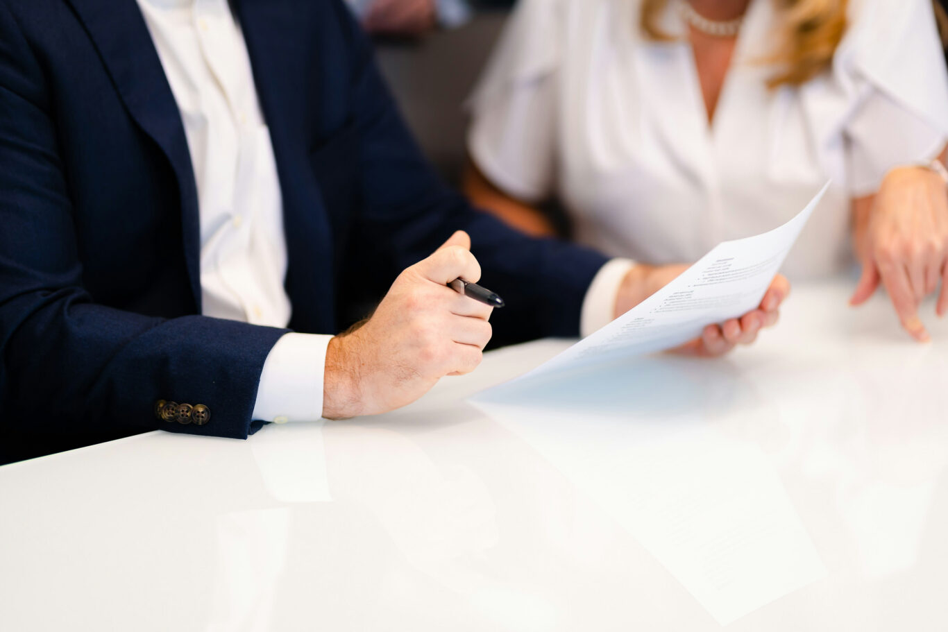 two people reviewing a document